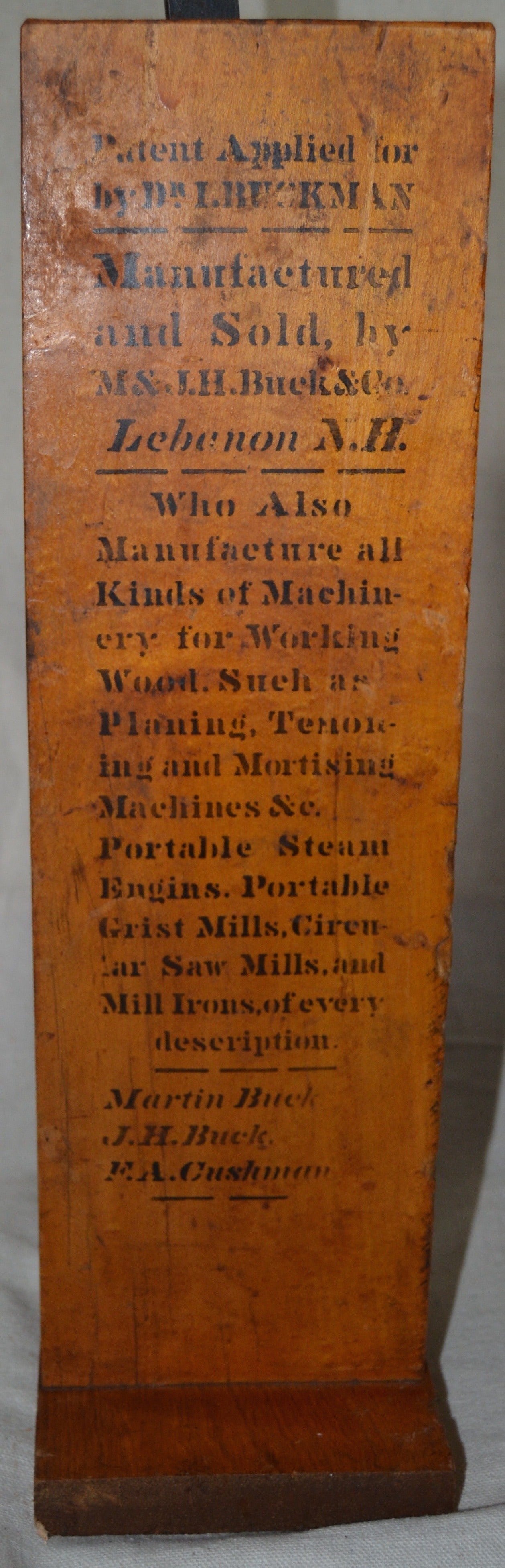 Cast iron and oak working model of a Victorian window raising mechanism, extensive stenciled text states "patent applied for Dr. I. Buckman, manufactured and sold by M. & J. H. Buck & Co. Lebanon, N.H." additional text indicates