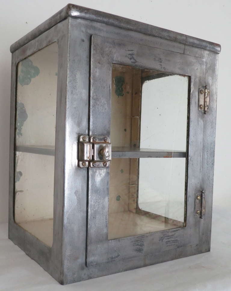 Steel cabinet with residue of original painted interior