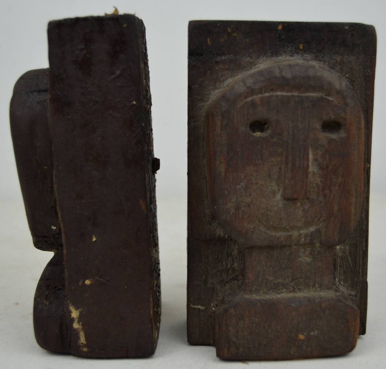 Pair of Folky Relief Carved Heads For Sale 1