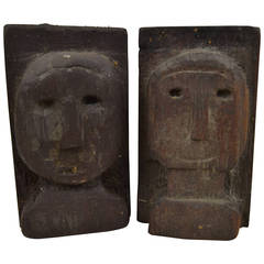 Pair of Folky Relief Carved Heads