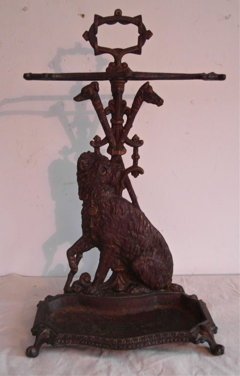 Lovely and well detailed 19th century dog motif stand. Great detail and retaining about 3/4 of original paint.