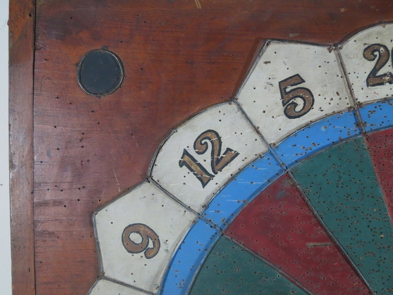 Beautiful polychrome 19thc. dartboard found in Pennsylvania. strong graphic qualities, 2 boards with breadboard ends.
