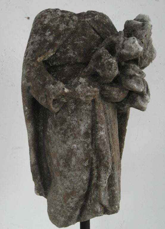 Early Marble Fragment of a Figure with Roses