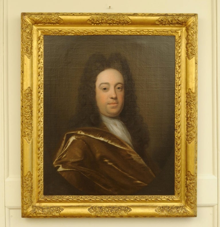 A good pair of 18th century portraits in original gilt wood frames.