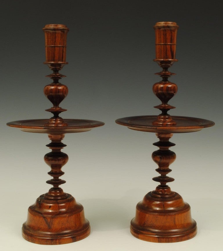 A finely turned pair of hardwood treen candlesticks following the Dutch 17th century brass models, Batavia was a dutch east indian company port and is now Jakarta 
Origin: Batavia