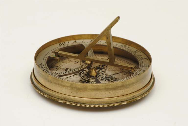 A nice example of an English brass pocket sundial