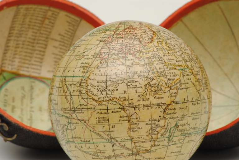 A good example of a late 18th century pocket globe by Cary in original condition in its fish skin case, retaining the original varnish and colour to the gores.