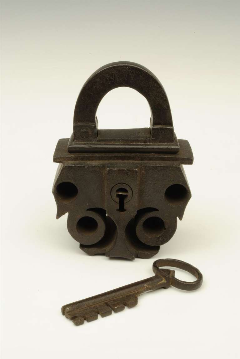 A rare example of a master padlock , dated 1588 with the original key. These master locks where made as examples to show the skill of the lock maker, there is a similiar lock in the Metropolitan museum in New York. 

Provenance: A south yorkshire