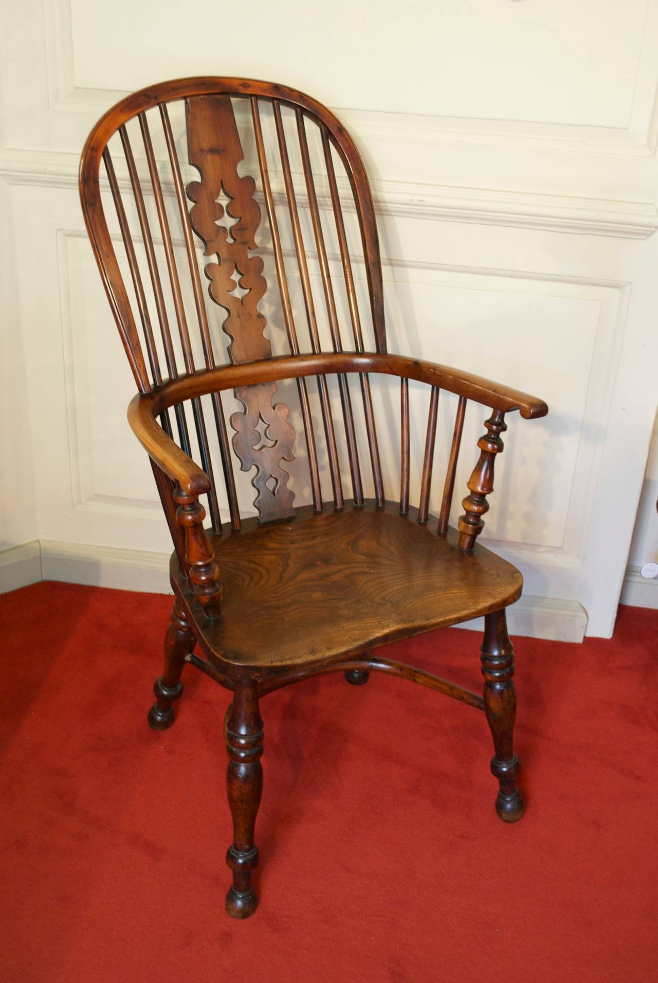 Two Nottinghamshire yew tree windsor armchairs with elm seats and christmas tree splats. Good colour and patination. 
A very well matched pair