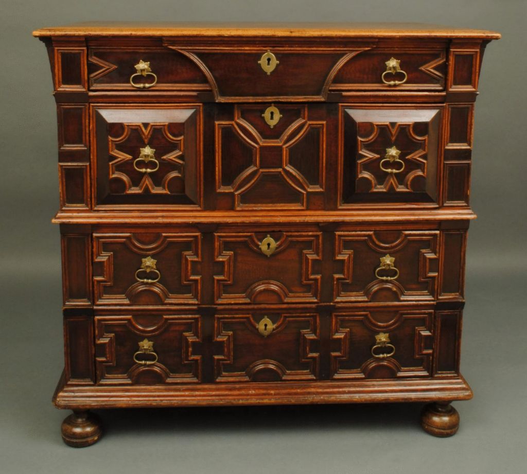 A superb example of a block front chest of drawers with geometric designs, with cedar mouldings and snakewood to the drawer fronts.<br />
Good colour and patination