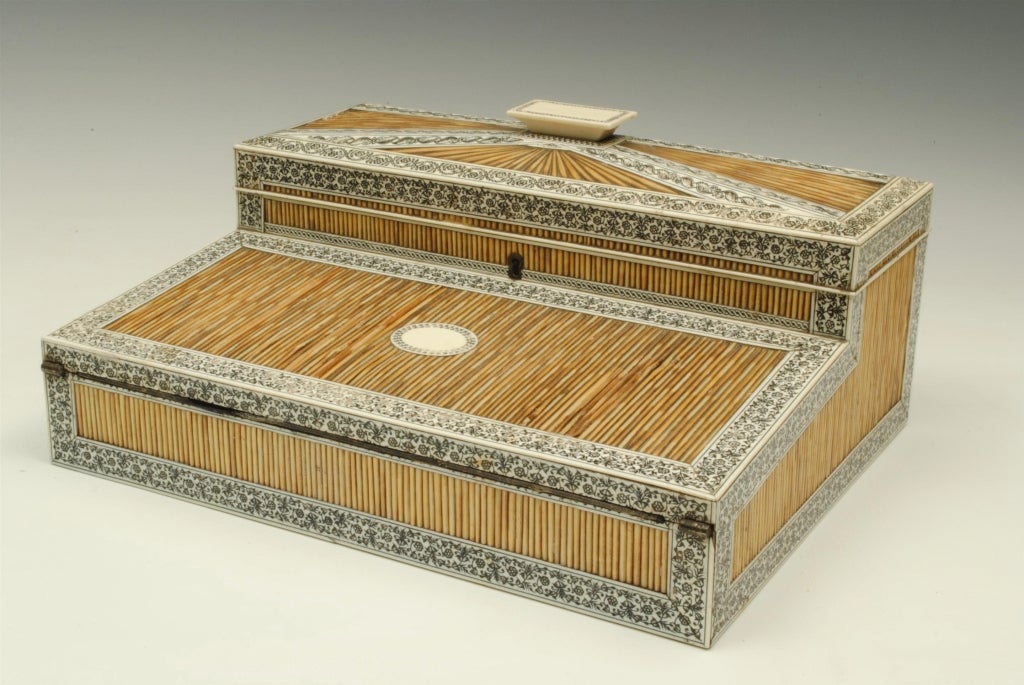 A good early 19th century Indian writing box with Ivory and penwork decoration.