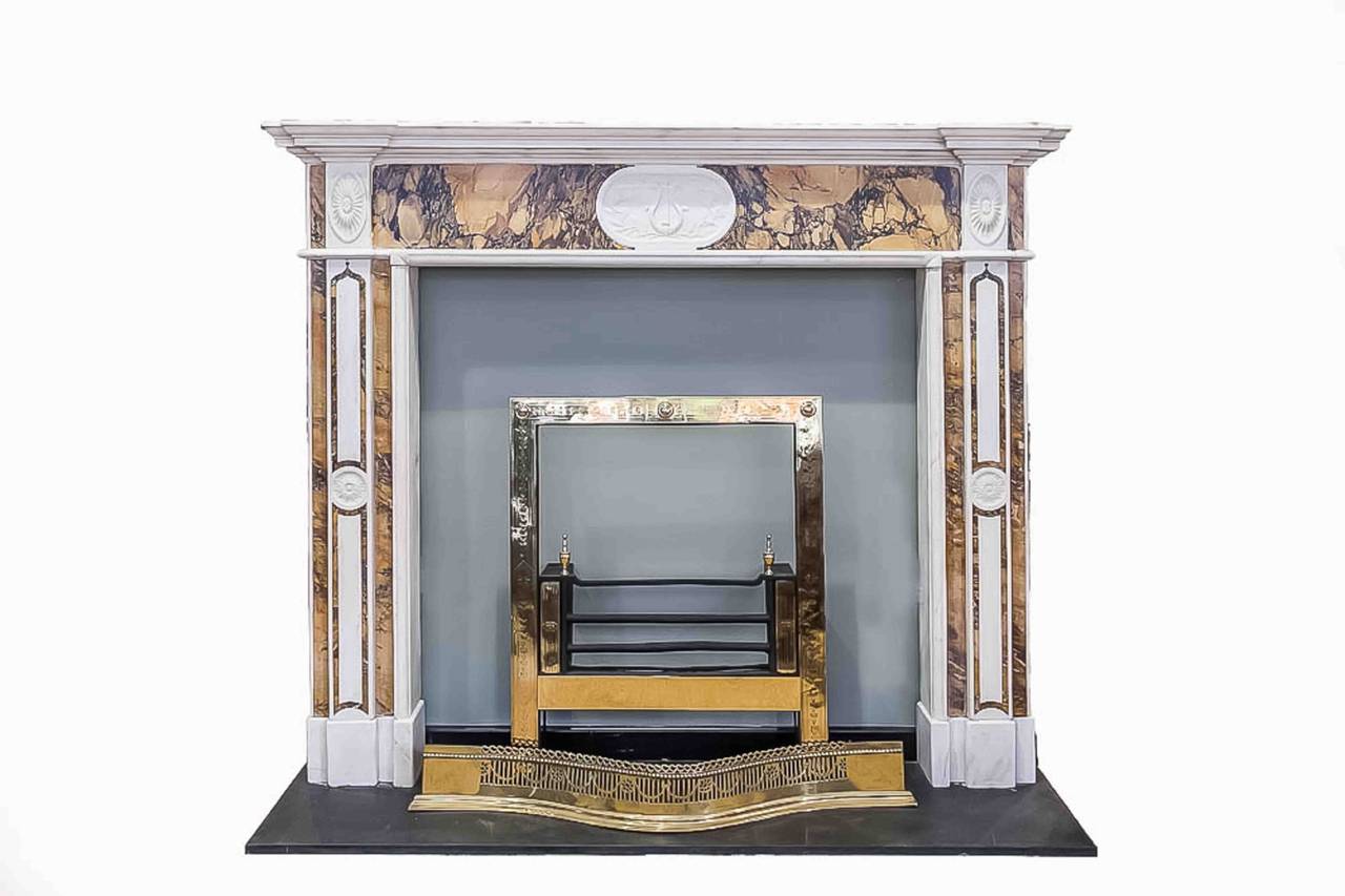 A fine Irish Siena marble fireplace.