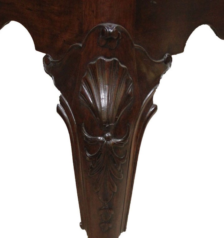An Irish 18th Century Mahogany Side Table on Cabriole Legs with Trifid Feet and Frieze with Shell in the Centre.
Height: 31