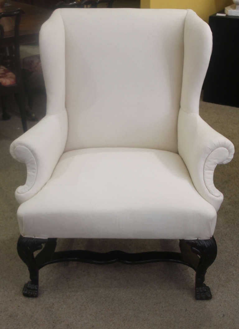 An 18th Century Mahogany Wing Chair.