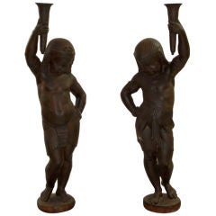 Vintage A pair of cast iron figures