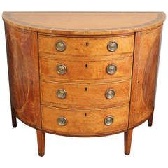 An 18th Century Satinwood Commode. Attributed to William Moore