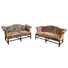 A Pair of Chippendale Settees.