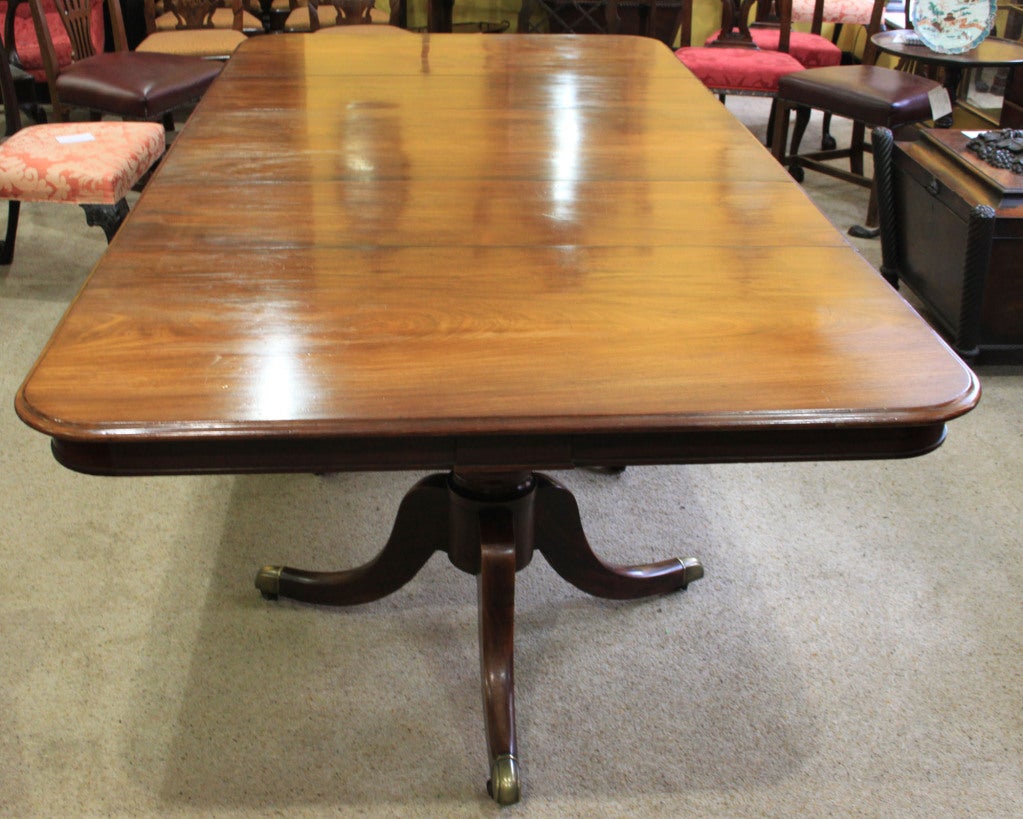 A Regency Mahogany Dining Table. With two additional leaves.
Height: 28 1/2