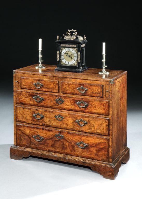 A rare walnut and burr walnut bachelor's chest