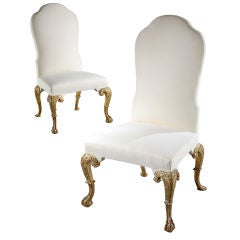 A Rare Pair Of George I Carved Giltwood Side Chairs