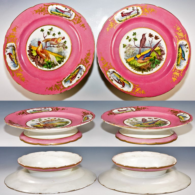 Everything on this superb pair of 19th century Old Paris tazza or raised plates is in fine form but the very outer gold rim, and it's rubbed a bit. That said, allow me to point out that each plate is in that deep delicious pink that we associate