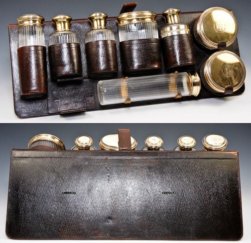 These just beg to be freed from their traveler's vanity stand, which would have been an inside fitting of a large late-1800s traveler's valise at one time, but now exists on its own, as shown. They are fabulous as a group, as we've shown you in our