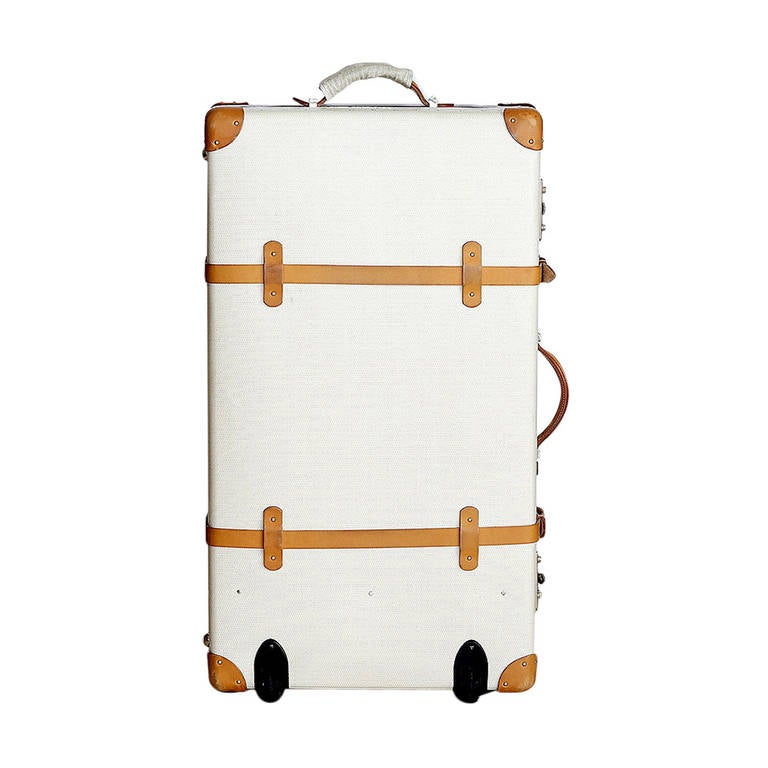 Guaranteed authentic Hermes suitcase with palladium hardware from the exclusive Faubourg Express line! 
Limited Edition beige chevron pattern hard case with wheels.
This suitcase is one of 3 that was available in the U.S.
Interior features smooth