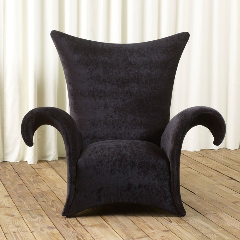 A single black Whimsical Chair. A great focus piece for any interior. Newly restored and reupholstered in elegant black Velvet