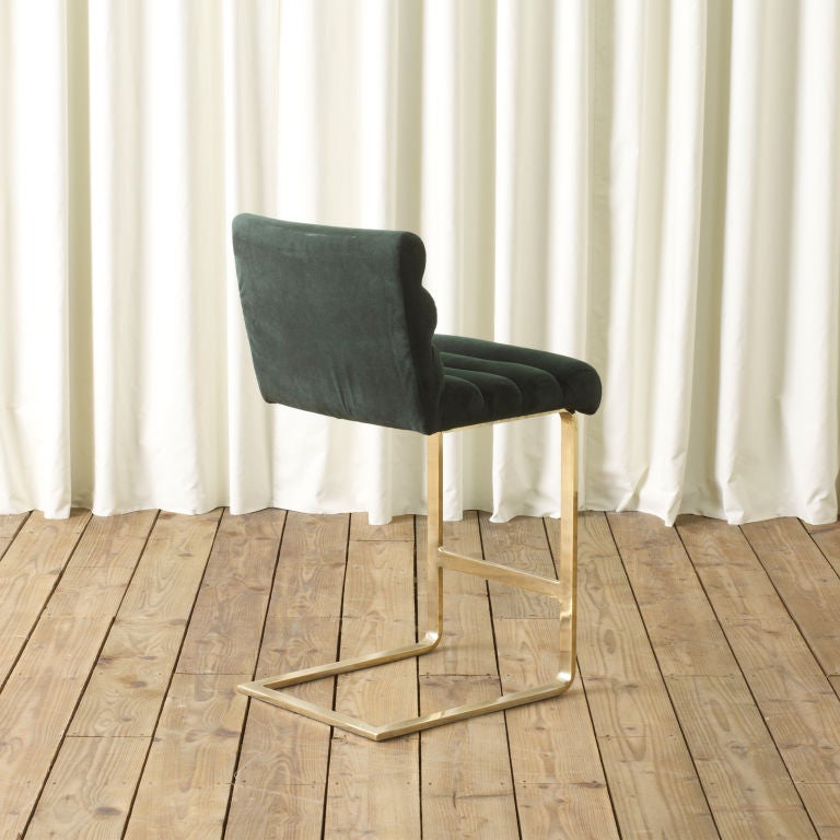 A great 70's set of 3 bar stools in original Green faux suede fabric with cantilevered brass bases by Leon Rosen for Pace