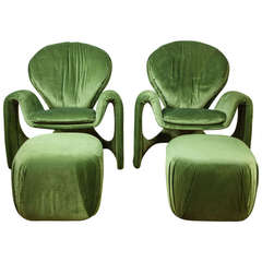 A Pair of Green Velvet Spider Chairs with matching Footstools.