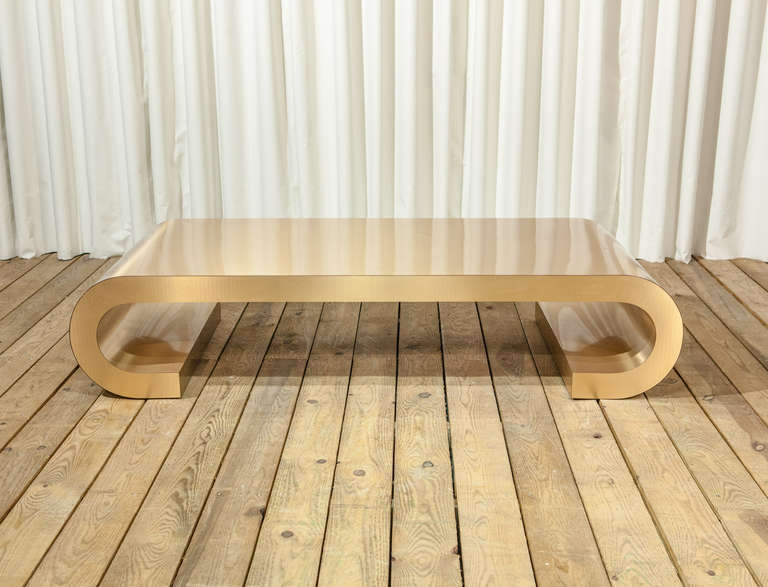 A Bronze Laminated Waterfall Coffee Table
