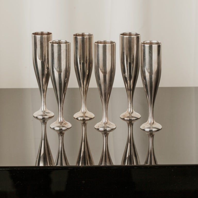 A wonderful simple set of elegant Gucci shot glasses in Nickel. Stamped on the bases