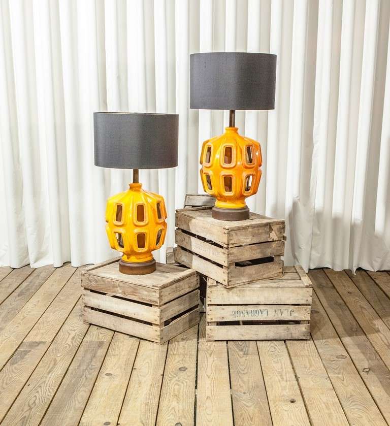 A Pair of Oversized Orange Ceramic Lamps