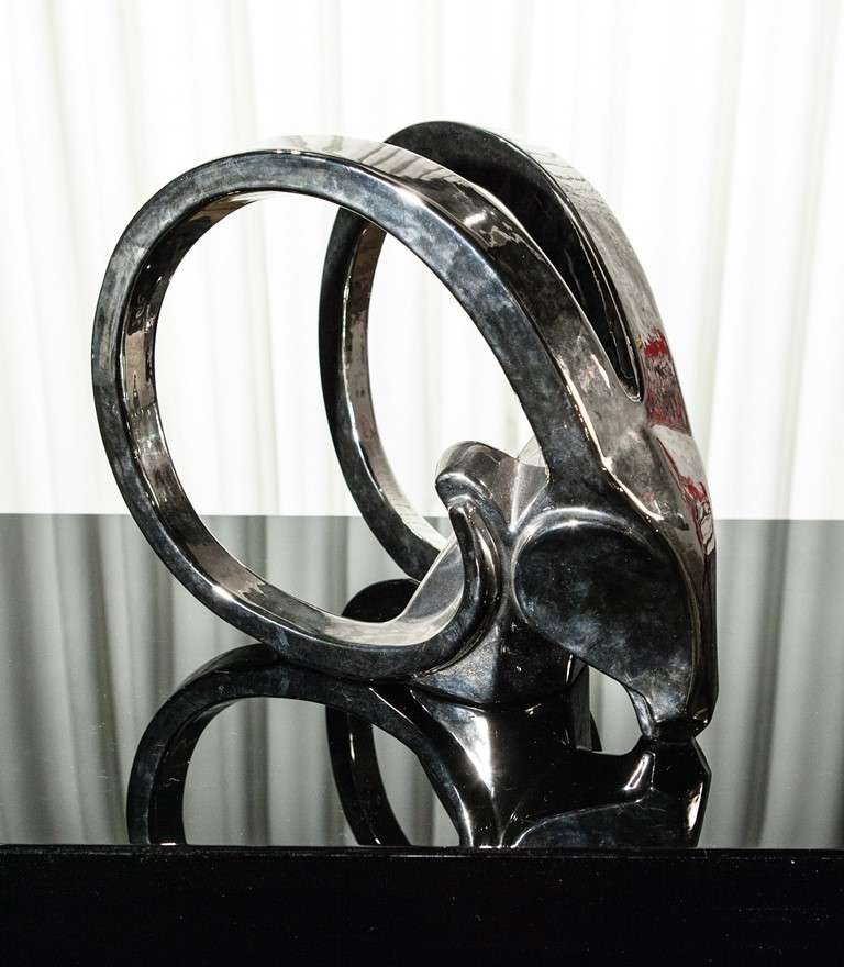 A Ceramic Chrome Plated Sculptural Ram's head