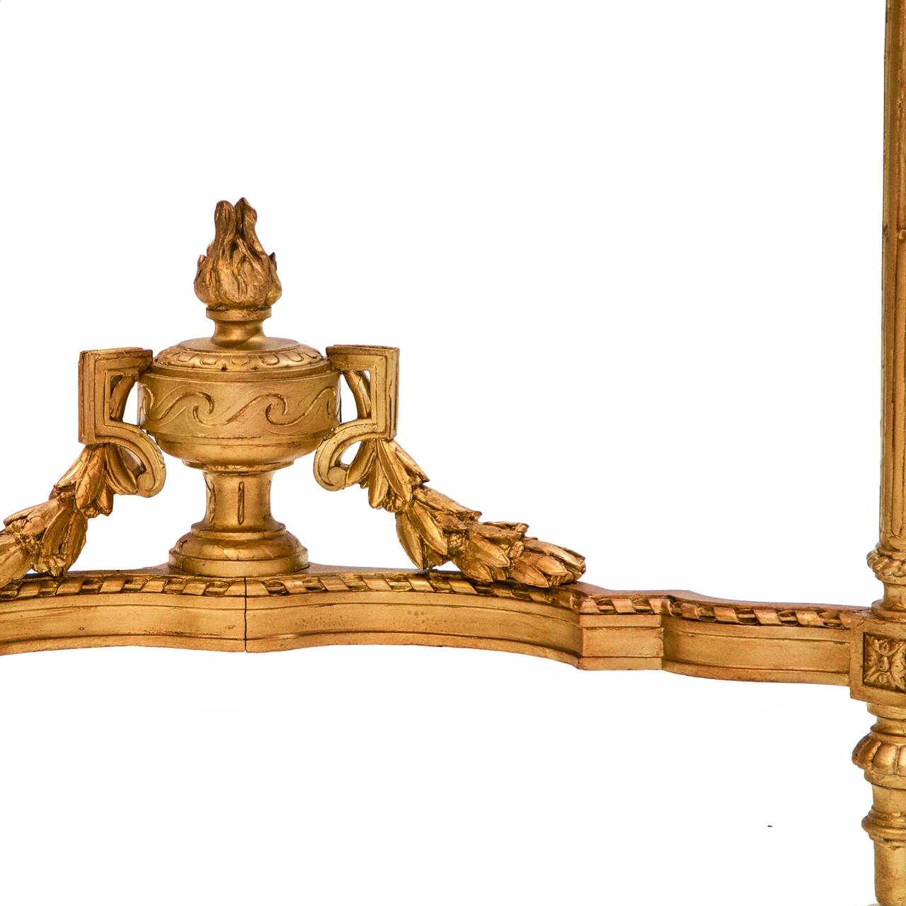 This is an unusual Louis XVI gold corner console. Nice size! Was large enough to server or hold an impressive urn. A fluted bow front centered with an outstanding 