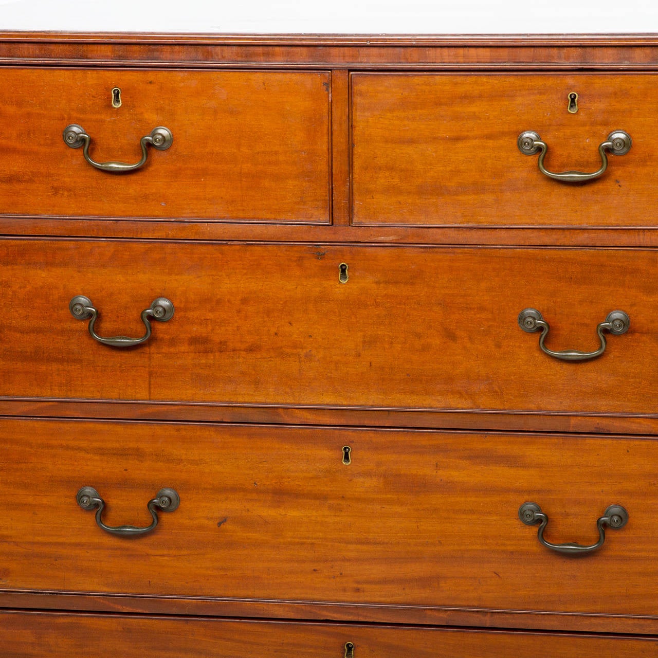 A very nice and simple, but functional English mahogany 2/3 chest of drawers on bracket feet. Circa 1840-1850

42″ wide

23″ deep

42.5″ tall