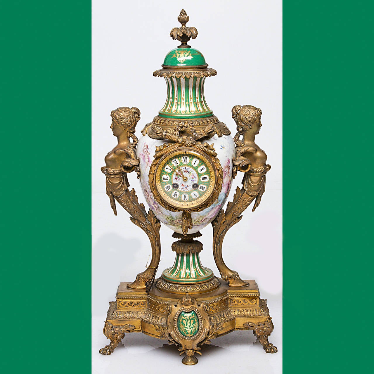 A superb Louis XV three piece bronze ormolu and French porcelain clock set. Signed 
