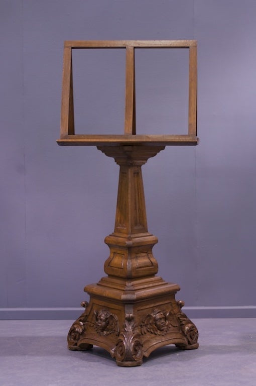 A very unique french Renaissance oak pulpit revolving bookstand. The column is set with raised panels leading to a strong carved base. Notice the carved faces. You can see the patina and chisel cuts in the photos. What a find. C.1860-1880<br