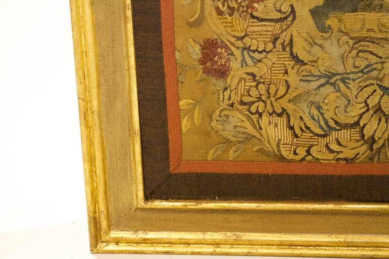 An old Flemish tapestry edged at a later date and applied to a vintage frame. Showing pheasants.