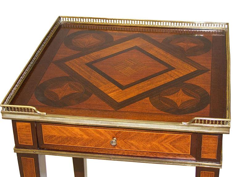 19th Century Inlaid and Brass Mounted Side Table. This table is superb quality.
