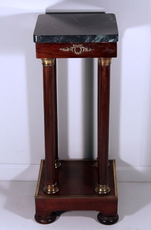 An Empire Mahogany Marble Top Plant Stand