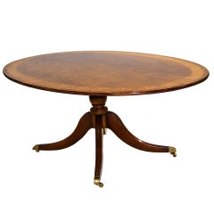 A Fine Oval Breakfeast Table Made By Restall Brown In England