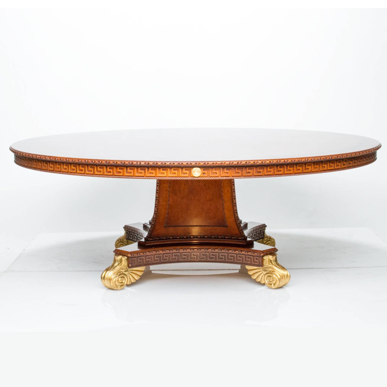 Superb English Regency dining table.

This table was purchased from a local estate and is truly amazing. This was benchmade for the client. They commissioned this table to be made specific to their taste. I find it exceptional. 
This table is