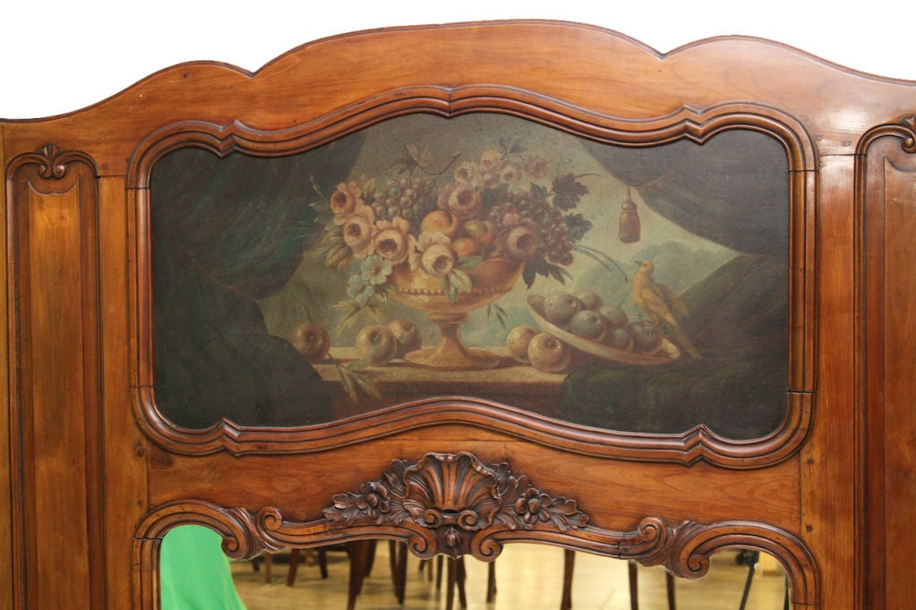 A Provincial Cherrywood Trumeau Mirror