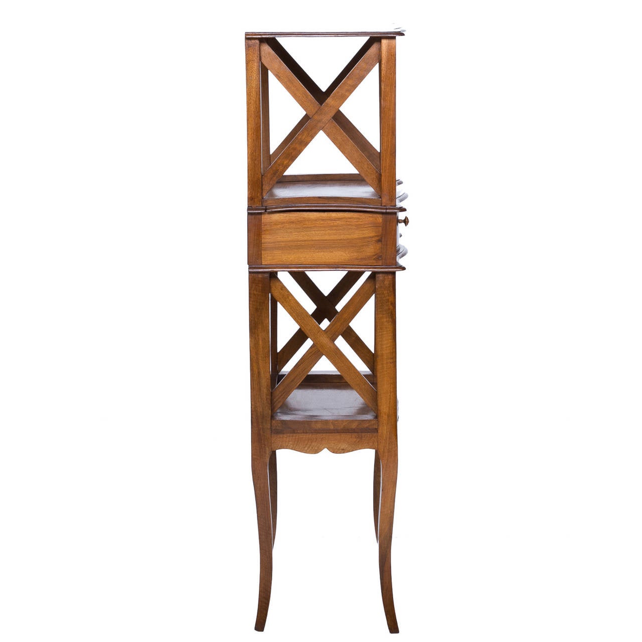 Provincial Walnut Standing Etagere from the 19th Century 

This nice quality etagere has three shelves and one drawer. The sides are configured with X slats giving it a nice side appearance. There is a serpentine front shape. Very nice patina also.