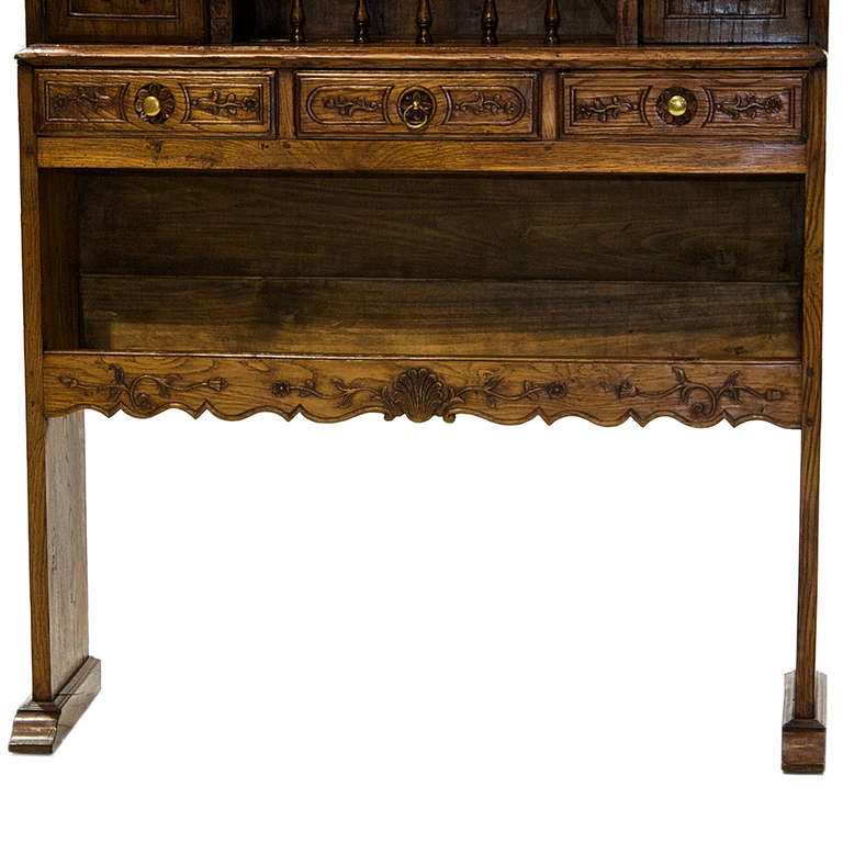 A fine Egouttoir-Vaisselier restored to its original condition. Made from chestnut and french oak. This piece is common with the missing lower shelf. This vaisselier is from the Normandy region of France. Fine carvings are present on the piece.