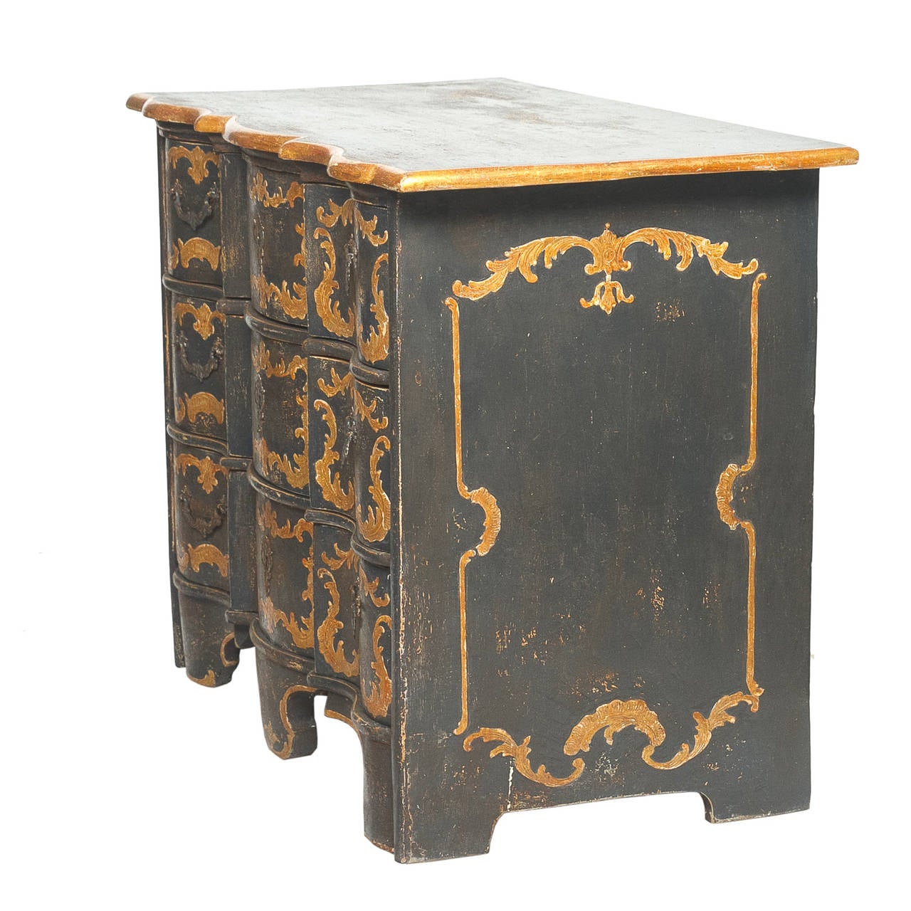 19th Century Continental Painted Commode

A spectacular early 19th century painted commode. Fabulous shape to the piece. The top is shaped to match the shape of the front and a exaggerated shaped apron and complimenting feet. The front and sides