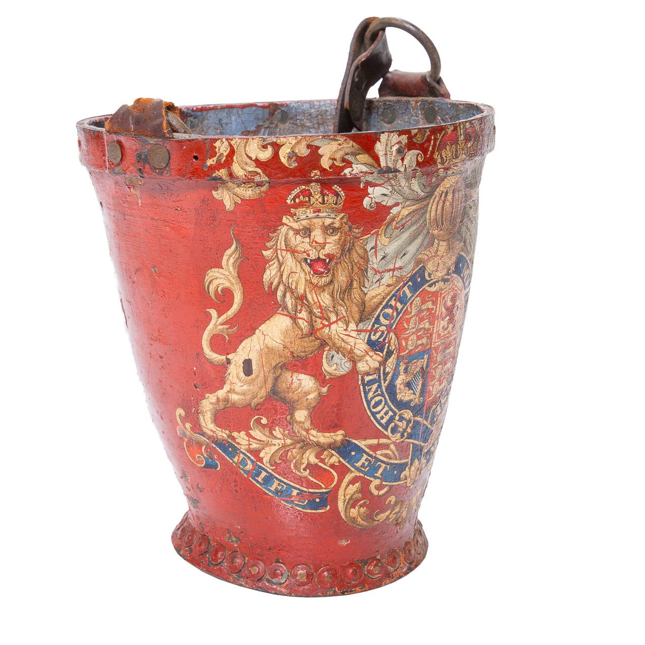 An original 19th century english fire starter bucket wrapped in leather and painted red with the Queen Elizebeth II coat of Arms. There is a leather strap for carrying and connected by two iron rings. These to me are great collectables. Makes a
