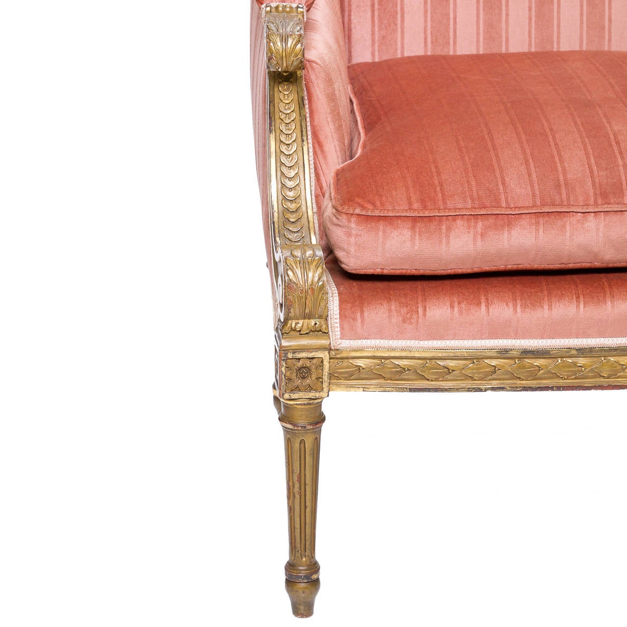 19th century Louis XVI giltwood settee a superb Louis XVI giltwood settee with a luxurious fabric. This settee to me is in the style of “Delafosse” A master of the garlands and noticing the two volutes was in his style. The settee has a unique
