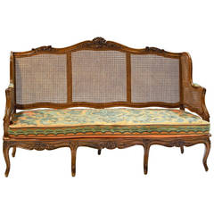 Louis XV Walnut Canapé with Cane Back